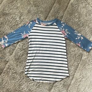 Size small top from online boutique Tickled Teal